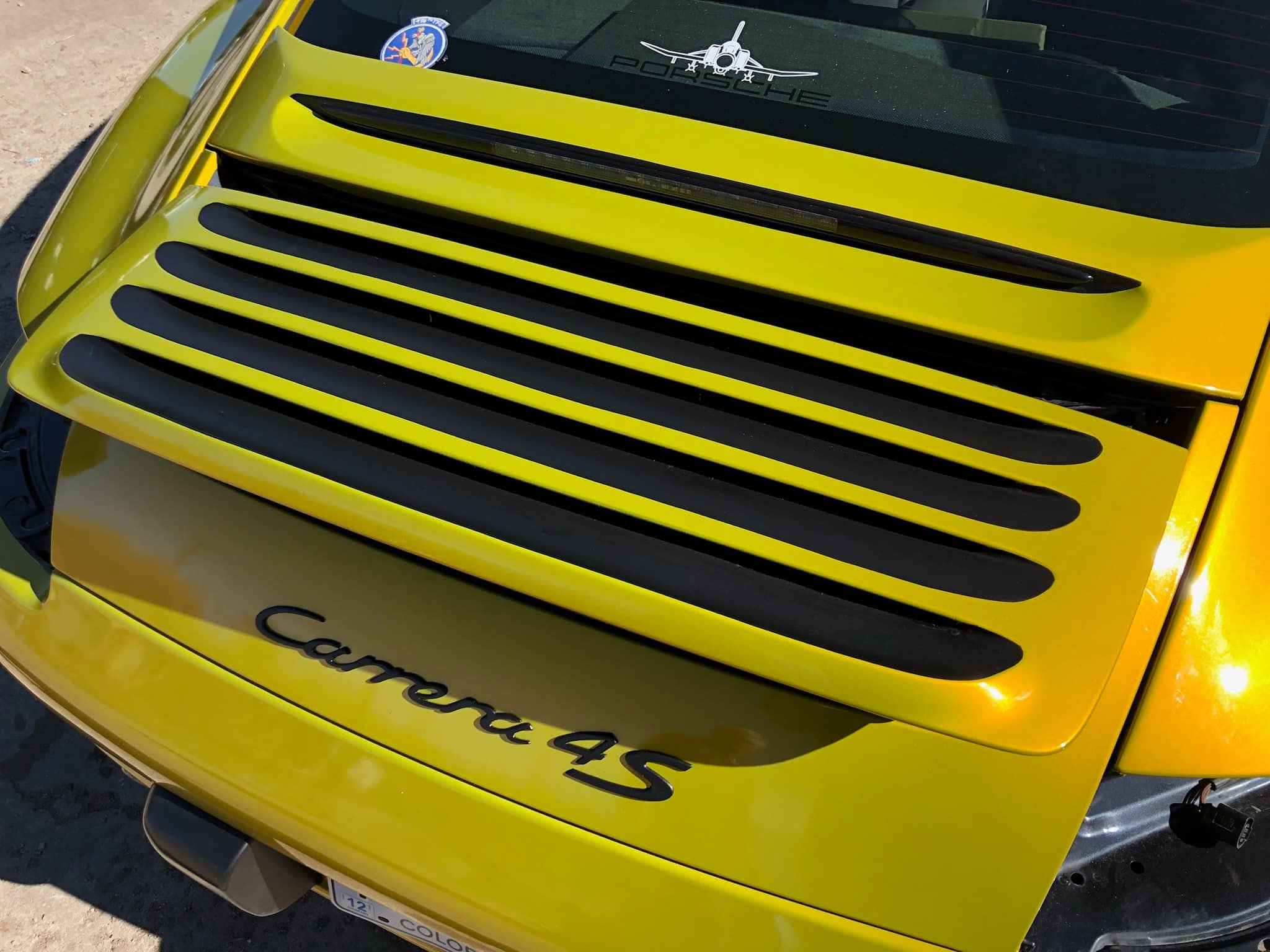 Custom partial vehicle wrap showcasing business branding in Denver CO