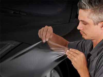 3M Paint Protection Film installation on vehicle hood at Big Dog Wraps