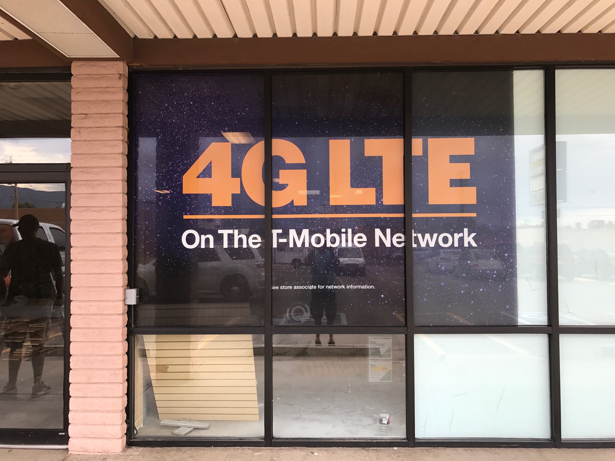 Business wall wrap installation by Big Dog Wraps serving Denver Colorado